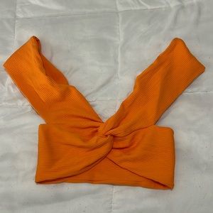 Orange twist front open back top
